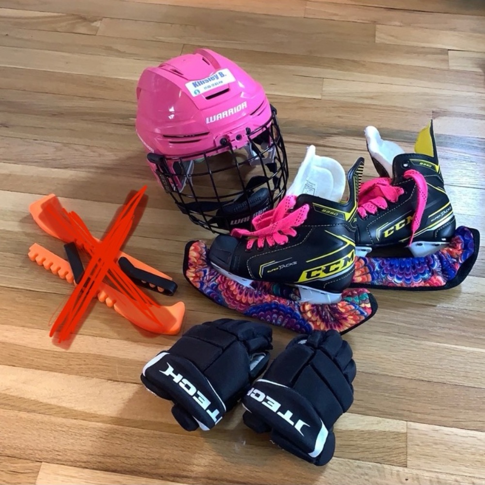 Hockey helmet, gloves, and skates